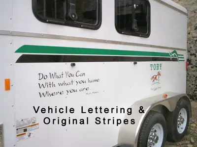Toby's Pet Care lettering and illustration on a cargo trailer